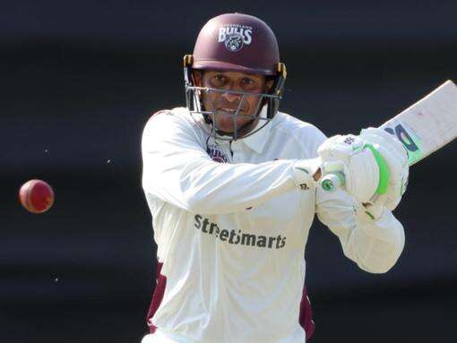 Queensland thump Tasmania, rise to second in Shield