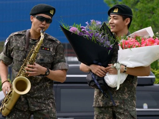 BTS' RM and V tease K-pop boy band's return after being discharged from South Korean military