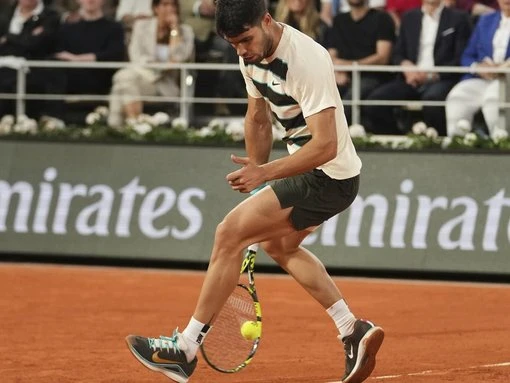 Alcaraz reaches French Open final after Musetti retires