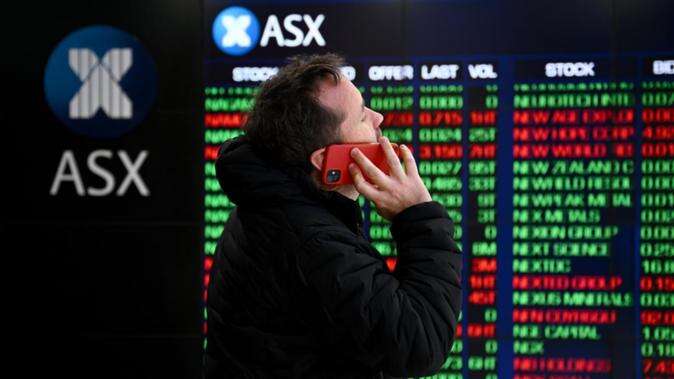 Aussie shares drop as traders wait for RBA decision