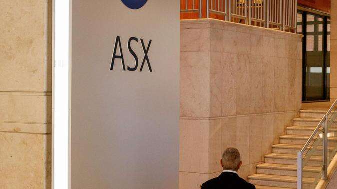 ASX climbs to new record high