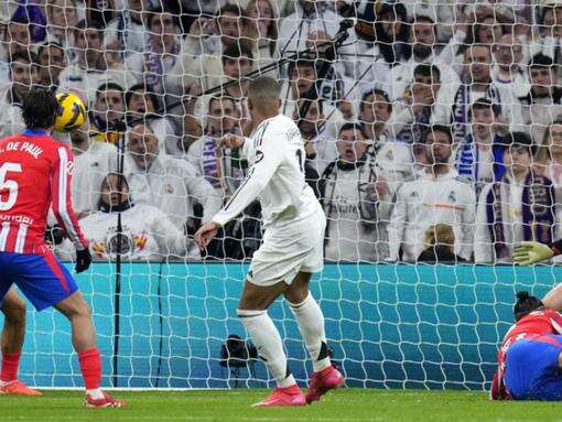 Real Madrid fight back for derby draw, retain lead