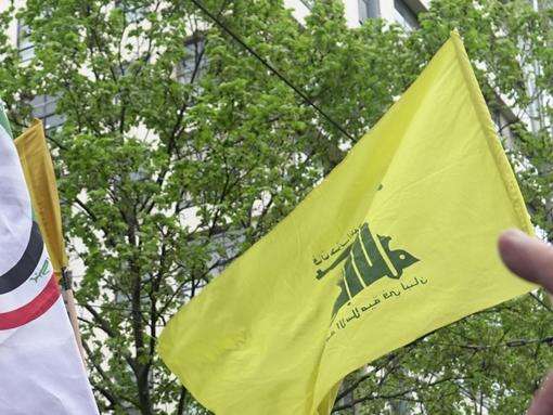 Protester allegedly waves terrorist flag