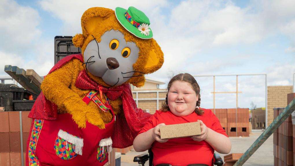 Telethon stars lay first bricks at 2025 beachside home