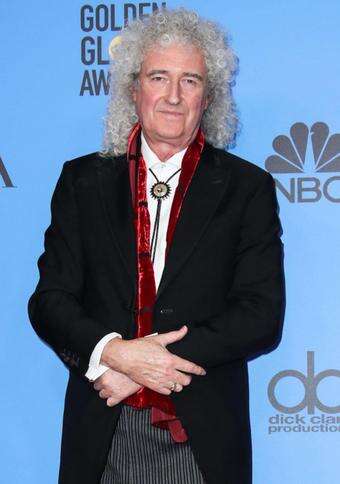 Sir Brian May feared he'd never play guitar again