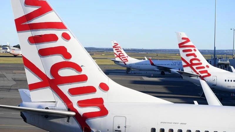 Virgin cabin crew member tests positive