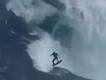 Moment surfer shredded by monster wave