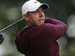 McIlroy loses club head and lead in rollercoaster round