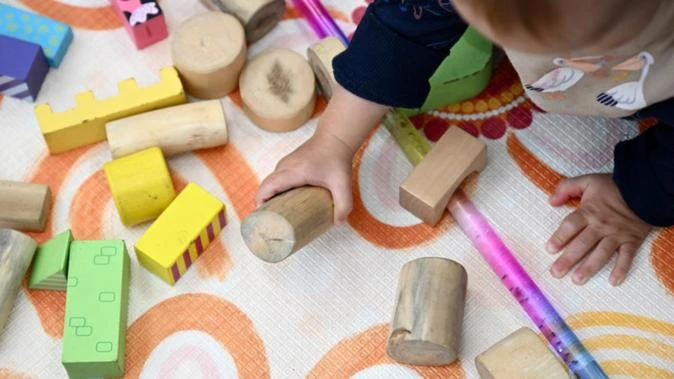 'Obsolete' childcare activity test in election focus