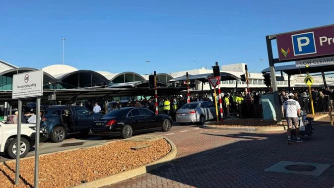 breakingChaotic scene as two Perth Airport terminals evacuated