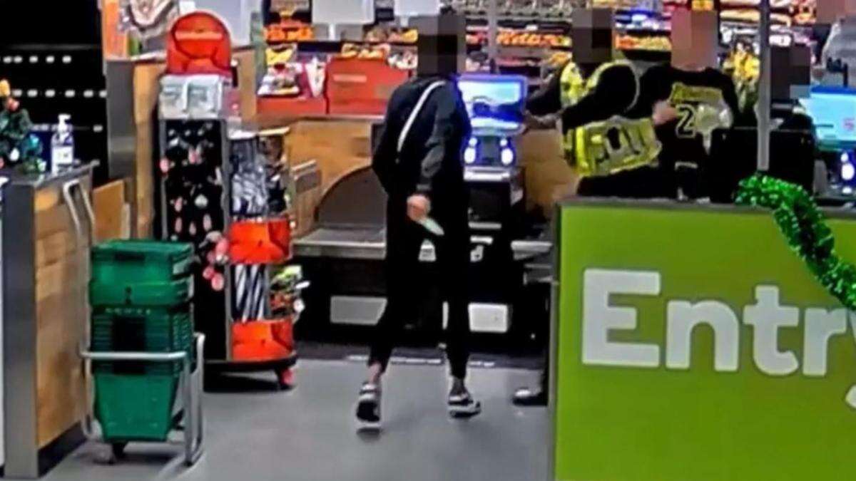 Chilling moment Woolies worker attacked