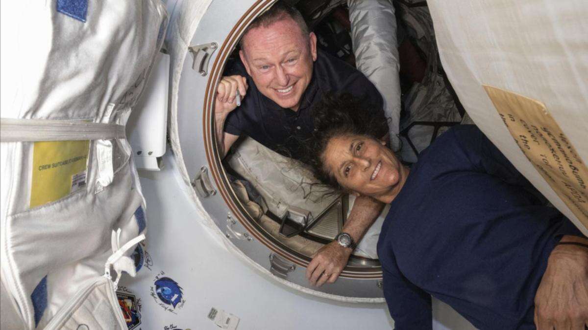 NASA's two stuck astronauts face more time in space