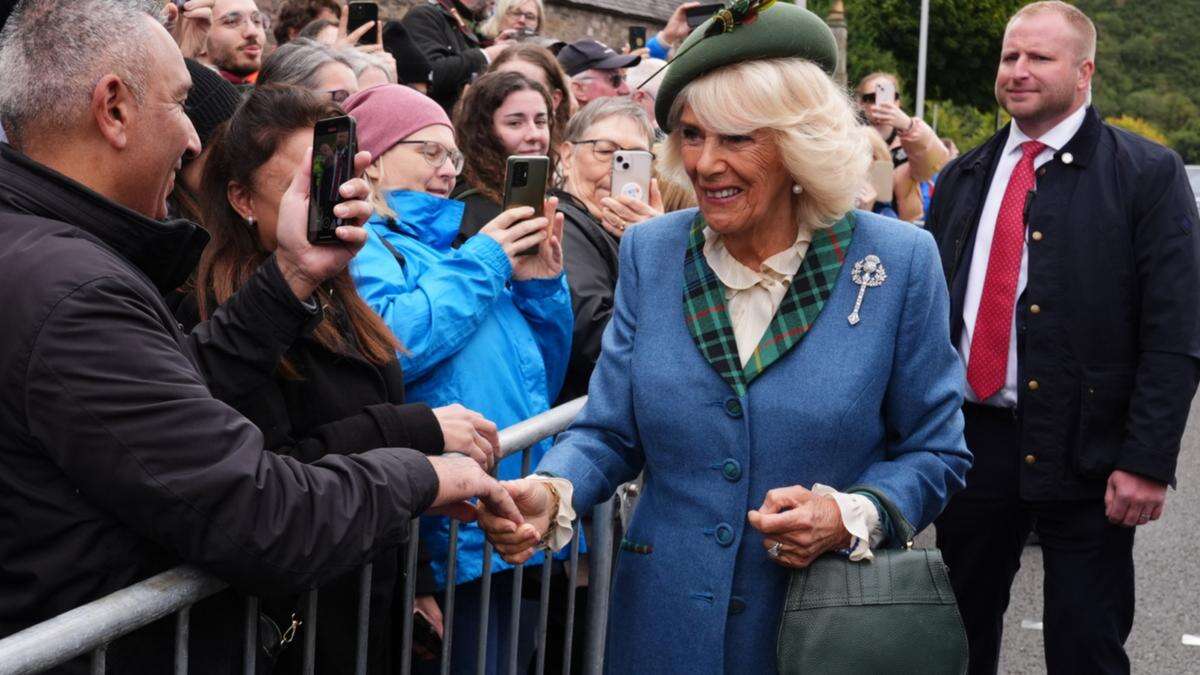 Queen Camilla uses 'old-fashioned' phone