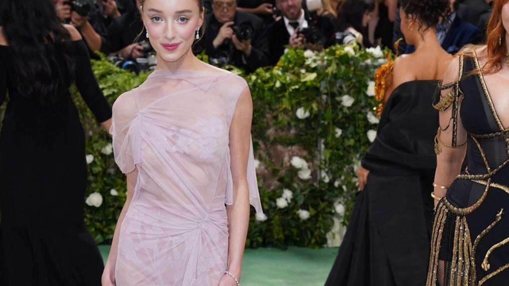 Phoebe Dynevor had 300 hand-sewn lace flowers on her Met Gala gown by Victoria Beckham