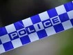 Man shot dead at front door in Canberra