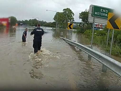 Fed-up police charge woman with driving through floodwaters