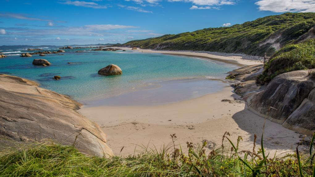 Popular beach remains closed as search continues for man