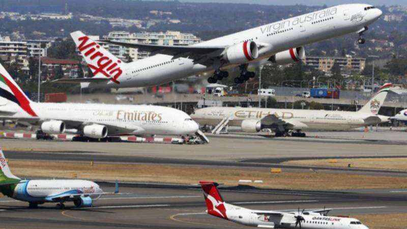 ‘Drunk’ Aussie couple facing $55k fine, jail over flight act