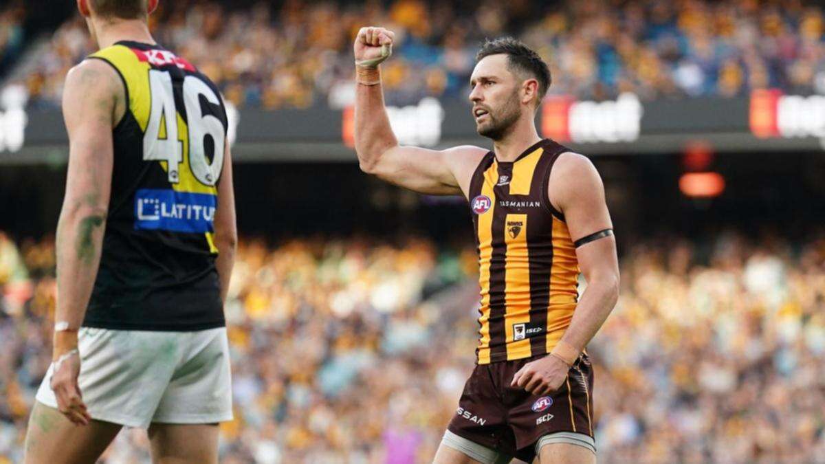 Hawthorn star Day injured in crushing win over Tigers