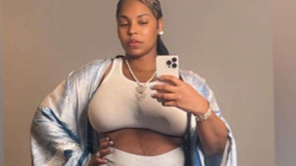 Ashanti reveals she secretly gave birth to a baby boy in July as she shows off postpartum body