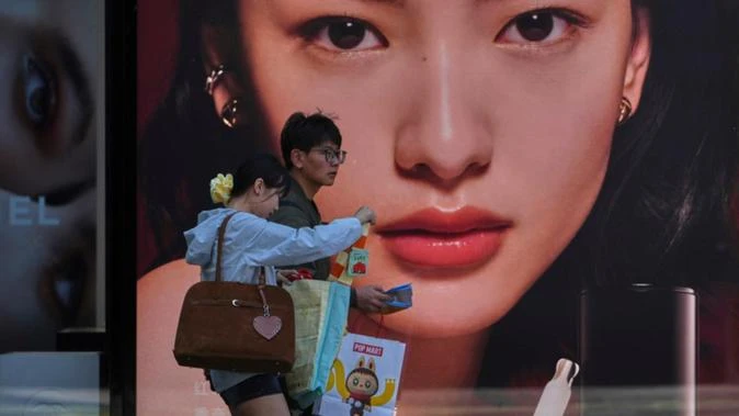 China's economy grows but US tariff shock looms large