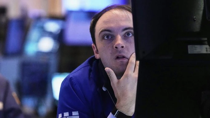 Wall Street slips amid focus on Trump's tax bill