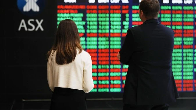 Aussie market dips on US tax jitters