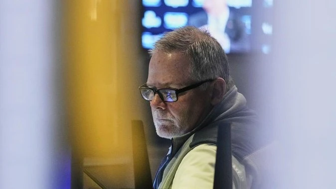 Wall Street slips ahead of Federal Reserve commentary