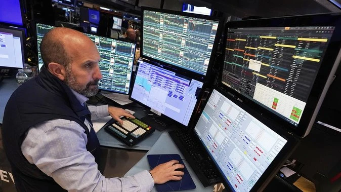 Wall Street opens flat, set to cap strong weekly gains