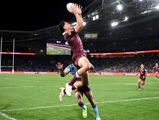 Coates floats high above To'o in Maroons aerial threat