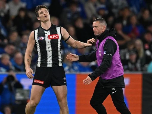 Ladder-leading Magpies revel in the AFL season grind