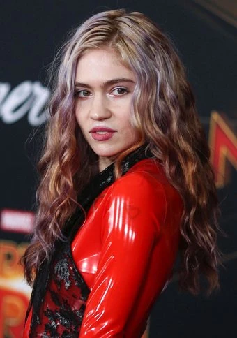 Grimes cancels World Pride performance 'to deal with family issues'