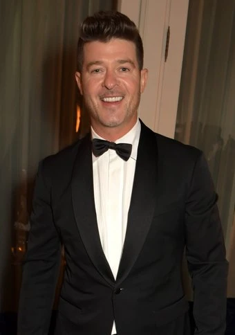Robin Thicke proposes to April Love Geary for a second time