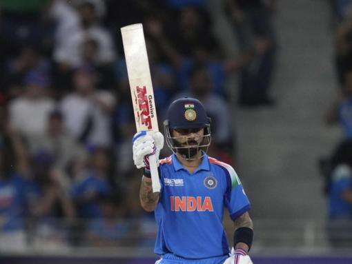 Kohli supreme again as India knock out hosts Pakistan