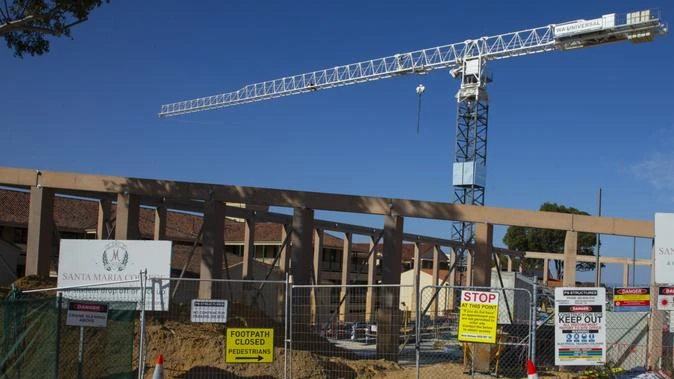 Major update after tradies injured in fall at private school