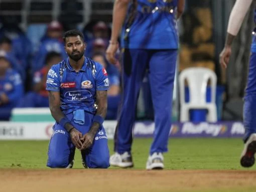 Gujarat survive showers in Mumbai to move top of IPL