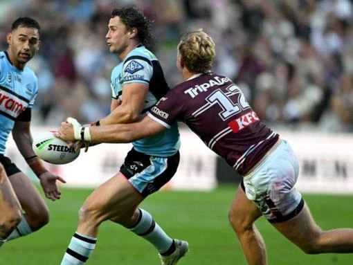 Sharks shine early and late to add to Manly's woes