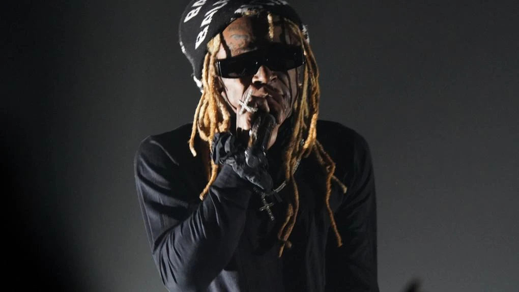 Lil Wayne accused of physical abuse by ex-girlfriend Denise Bidot