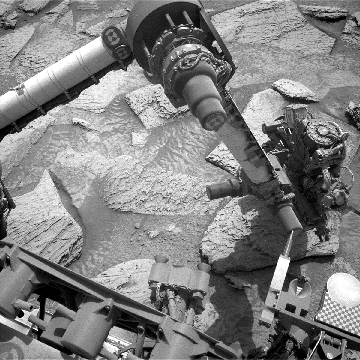 Shake it off: NASA's Curiosity rover gets its robotic arm stuck inside a rock on Mars