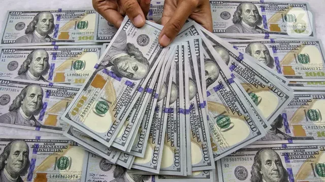 USD Menguat 11 Desember 2023, Rupiah Tertekan ke 15.600 per Dolar AS