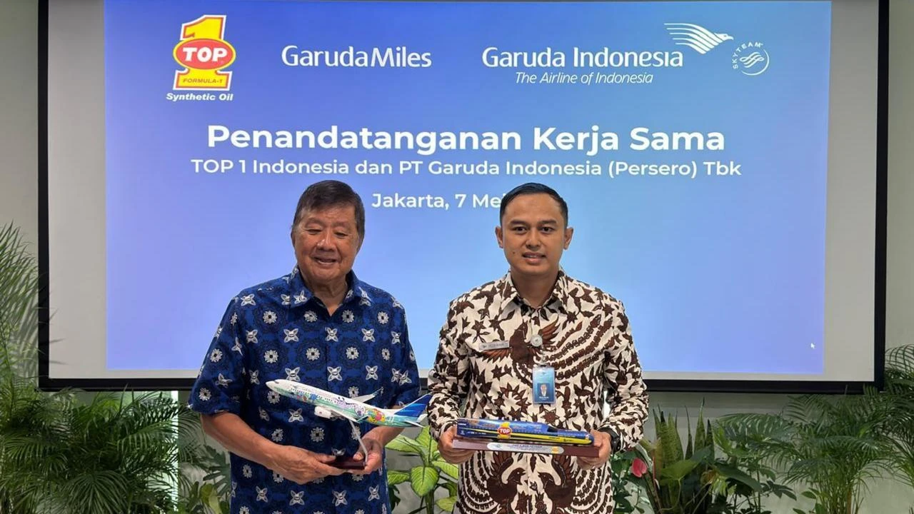 TOP 1 dan Garuda Indonesia Jalin Kerja Sama Program Loyalitas Pelanggan