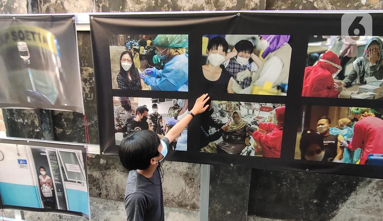 FOTO: Pameran Foto Jurnalistik Ingatkan Warga Pentingnya Protokol Kesehatan COVID-19