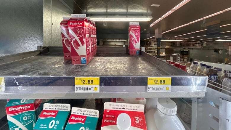 Walmart slapped higher prices on one-litre milk cartons than permitted by Manitoba law