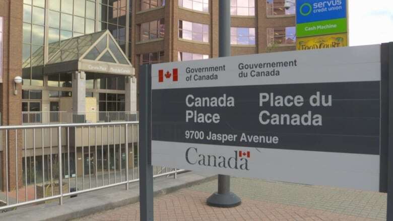 Edmontonians forced to wait in line for hours after passport office closed