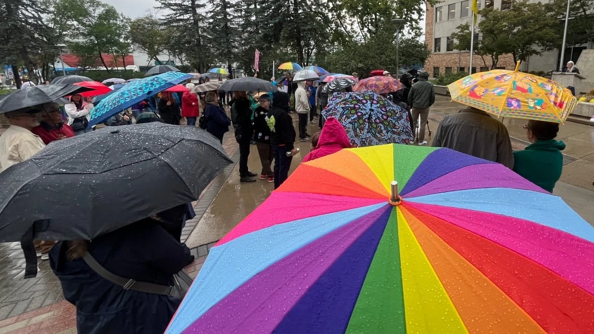 Protesters clash with mayor over MAGA musician's Saskatoon worship concert