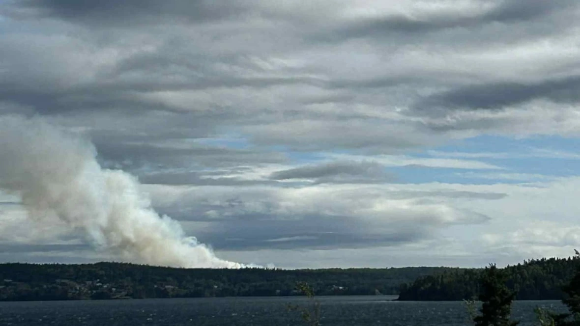 2 schools closed as crews fight Lethbridge wildfire