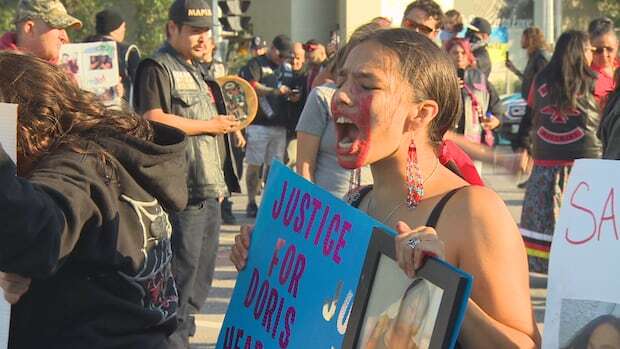 Vigil for woman struck down by vehicle temporarily shuts down Winnipeg bridge