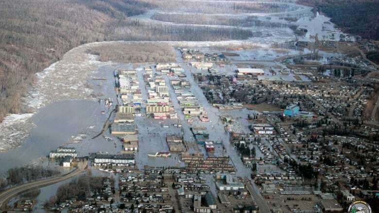 With walls, berms and raised roads, Fort McMurray is working to keep its river from overflowing