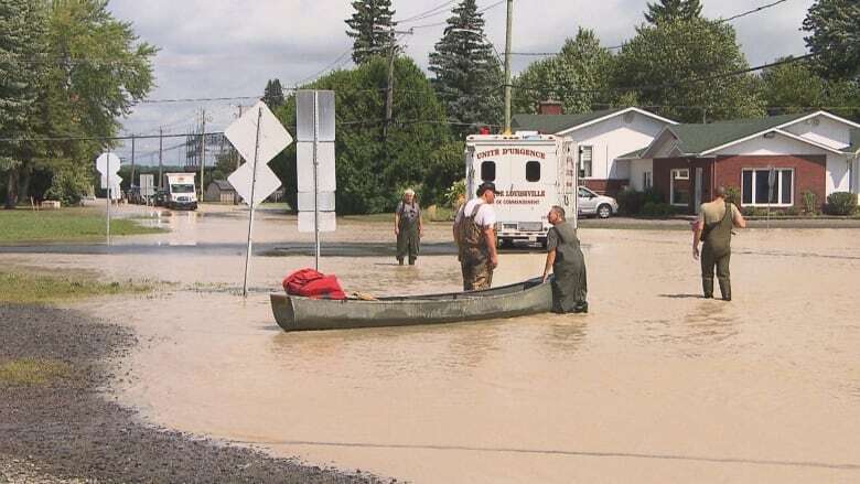 Cut off from drinking water and roads, Quebec towns face daunting cleanup after flooding