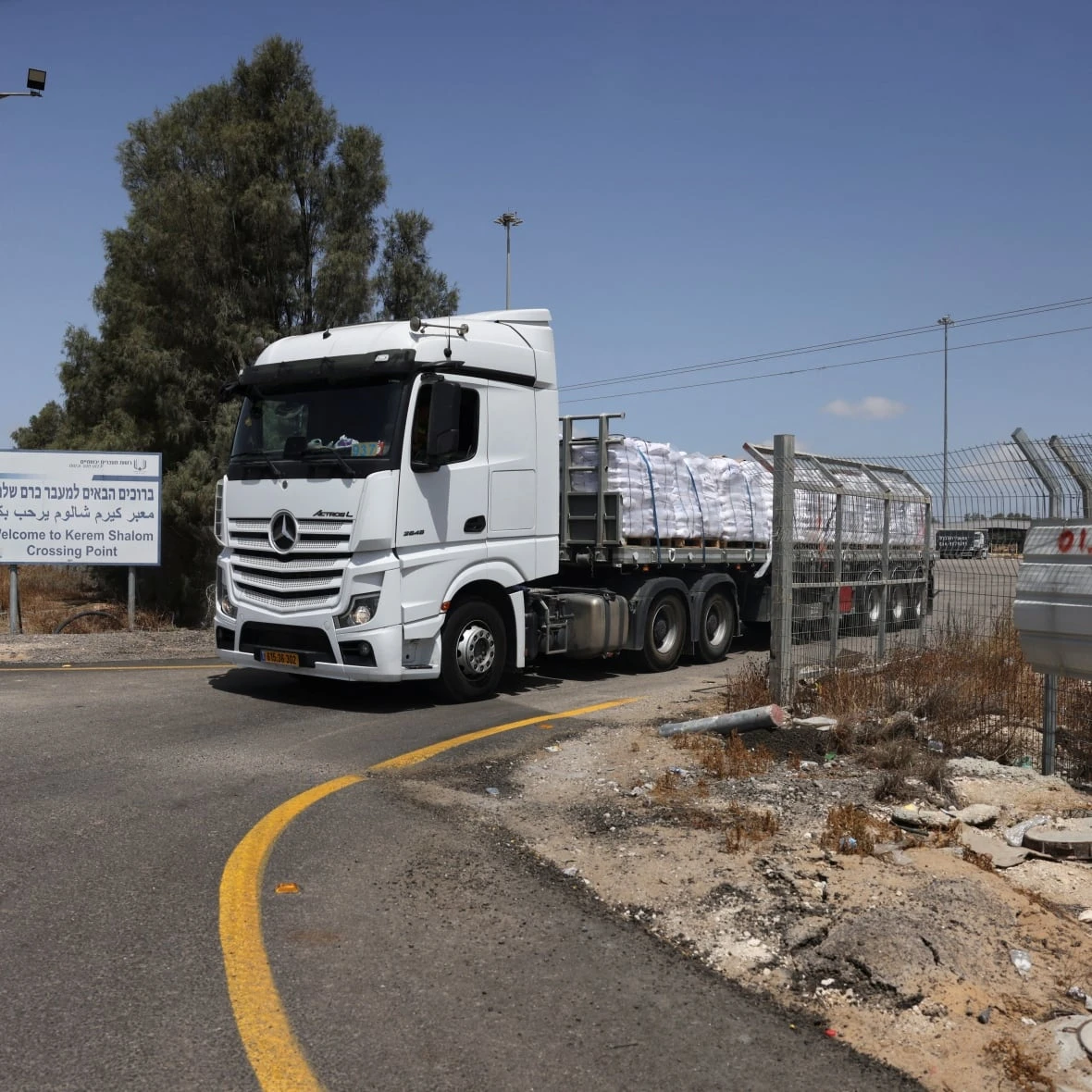Israel to 'control all parts' of Gaza, Netanyahu says, as aid trucks wait to enter territory